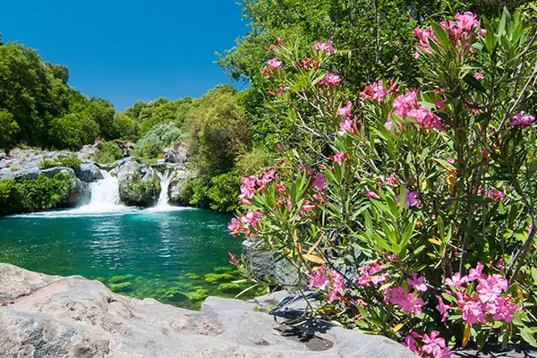 Alcantara river park Gorge Waterfall in Sicily